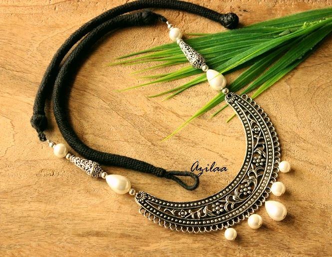http://www.azilaa.com/pics/Ethnic-designer-white-pearl-handmade-necklace-set-41102_1_full.jpg