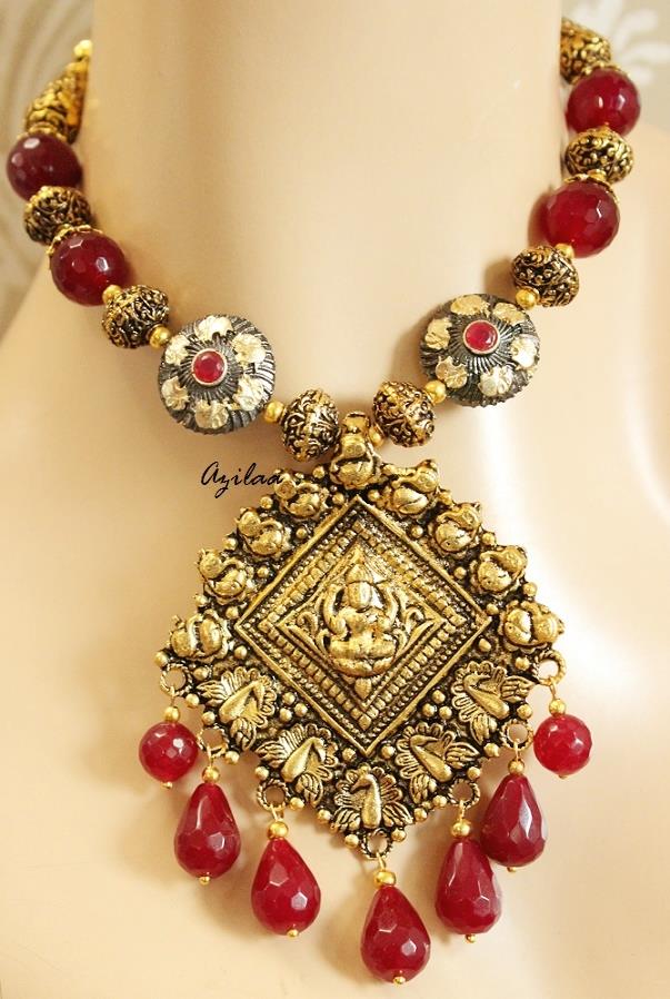 Maroon necklace set antique gold Lakshmi Ganesh pendant at ?2950 | Azilaa