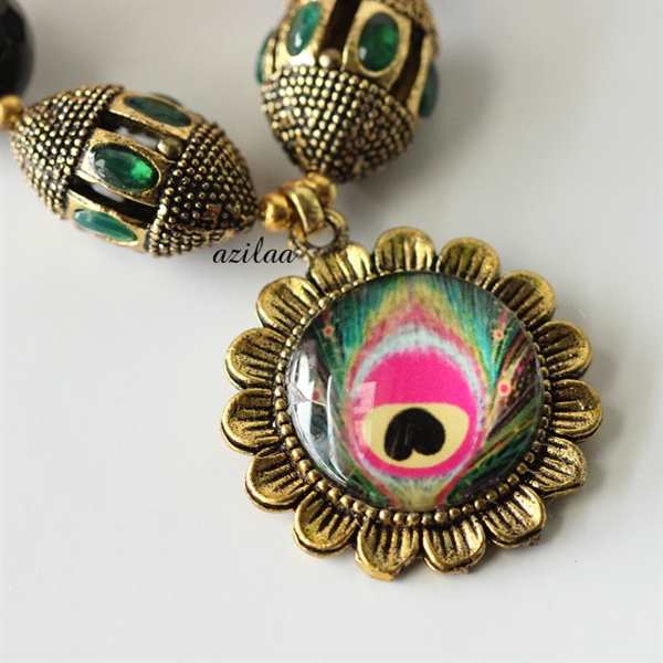 Peacock multi color antique gold tone necklace earrings set at ₹1950